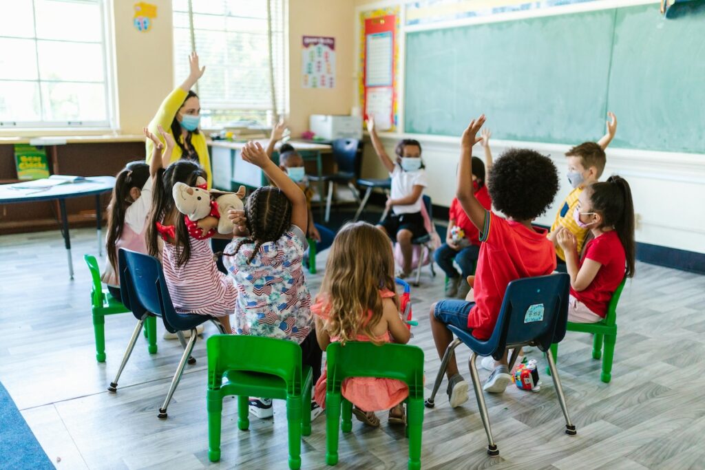 Children in circle in classroom