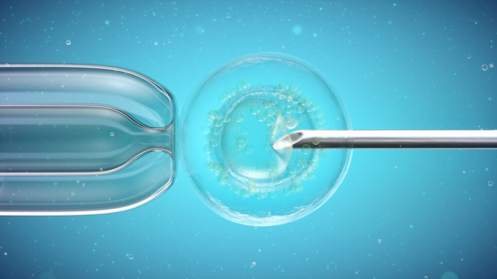 Computer illustration of a needle puncturing a cell.