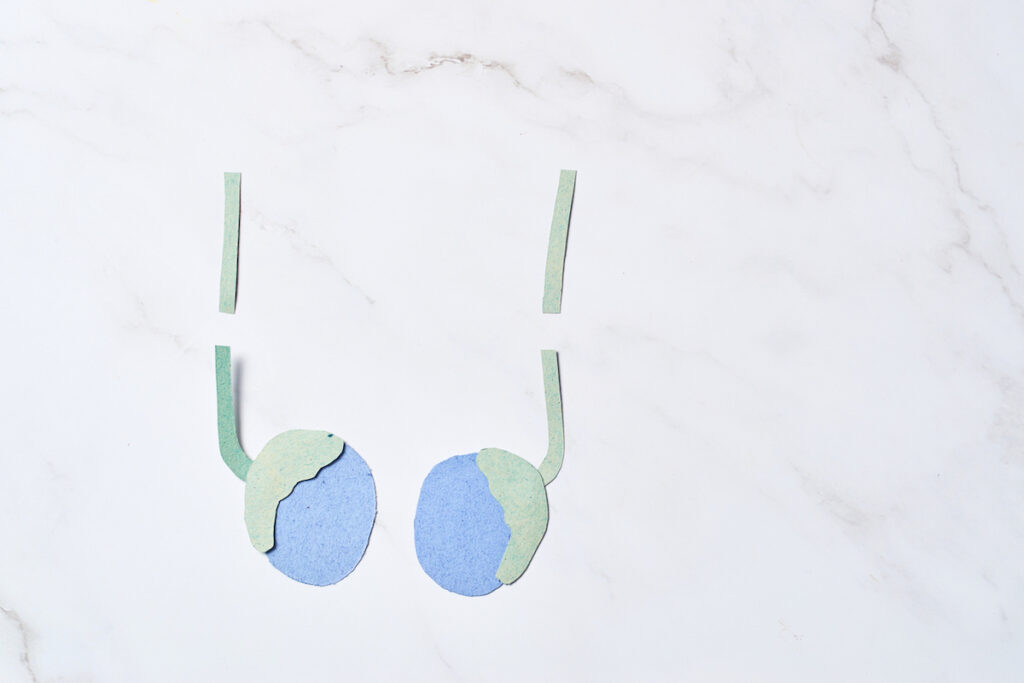 Illustration of a vasectomy made with construction paper.