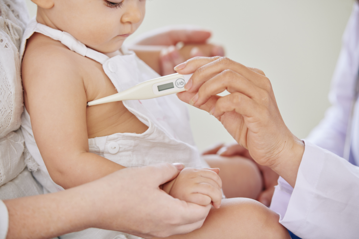 A baby being tested for fever