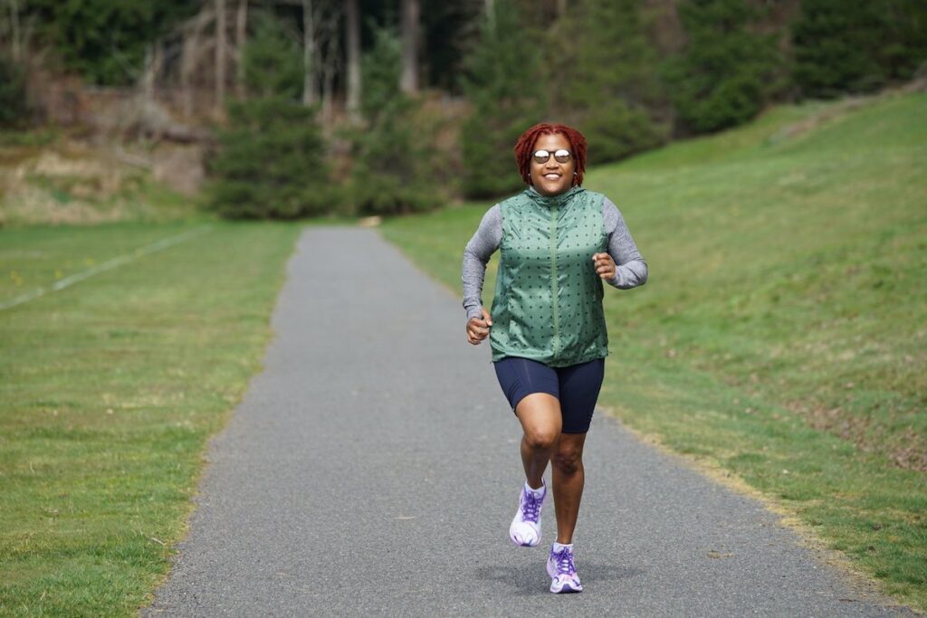 Woman running on trail