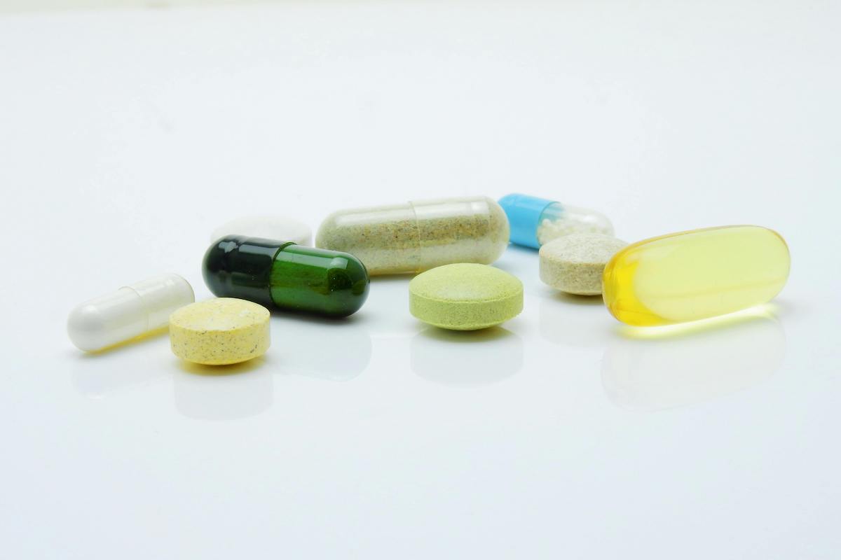 Pills on white background