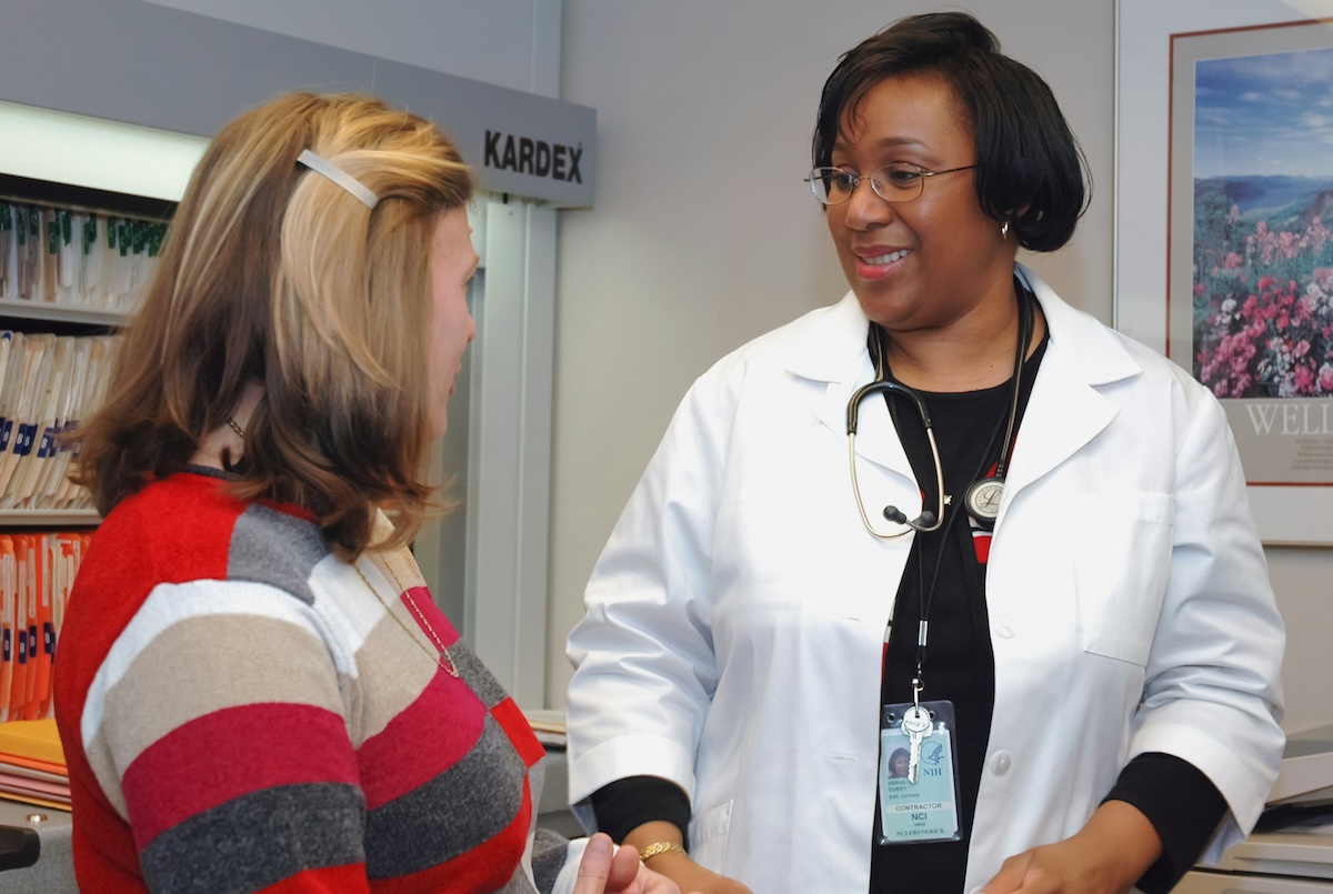 Patient talking to doctor
