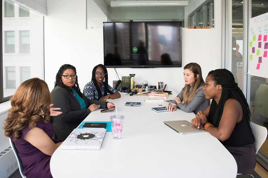 Women sitting around a conference table