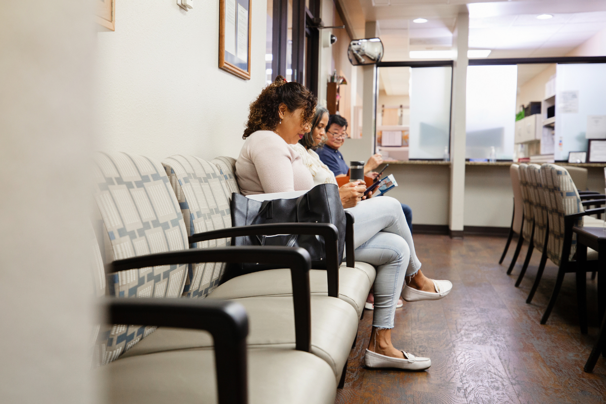 People waiting in a doctor's office.