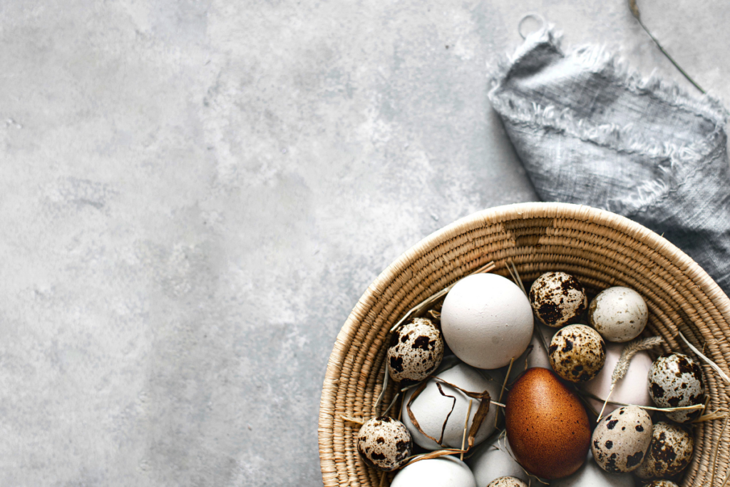 A basket of variety of eggs.