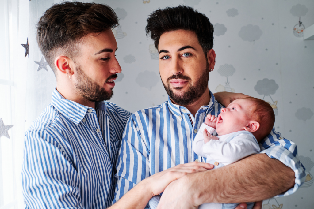 A queer couple with a baby.