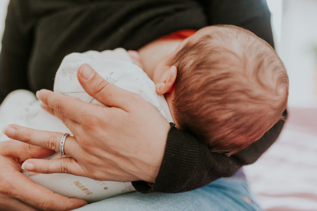 A baby being breastfed.