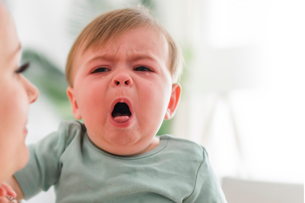 A baby coughing hard.